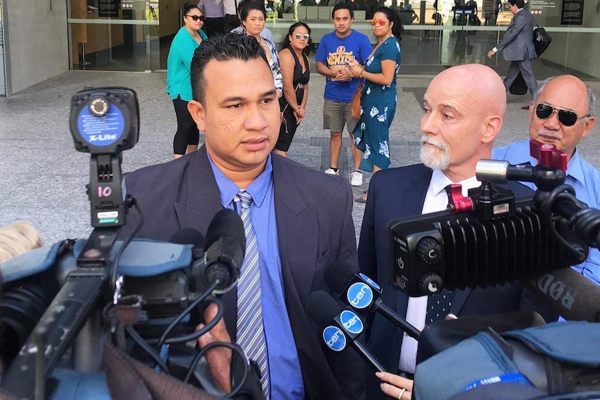 Phillip Pama talks to the media outside the District Court in Brisbane