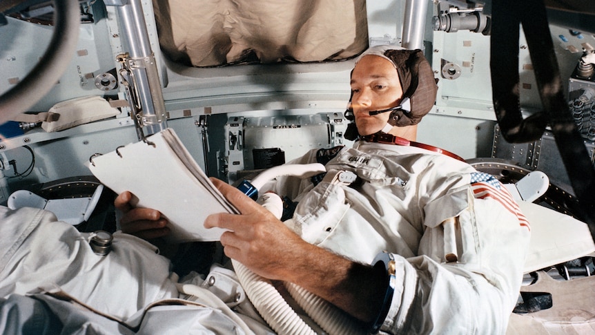 Michael Collins in astronaut gear.