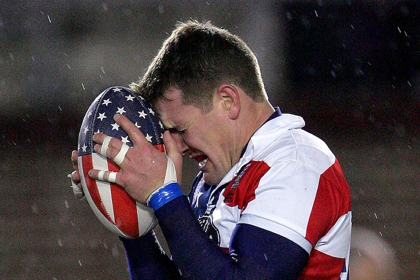 A man reacts after nearly scoring a try against Australia