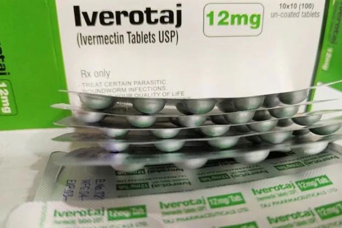 Blisters of tablets in front of a box for the drug Ivermectin