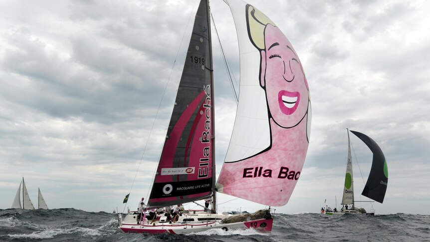 Ella Bache lets the spinnaker out at the start of the Sydney to Hobart yacht race.