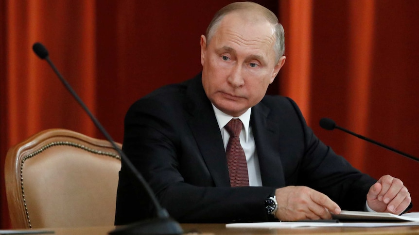 Putin looks displeased