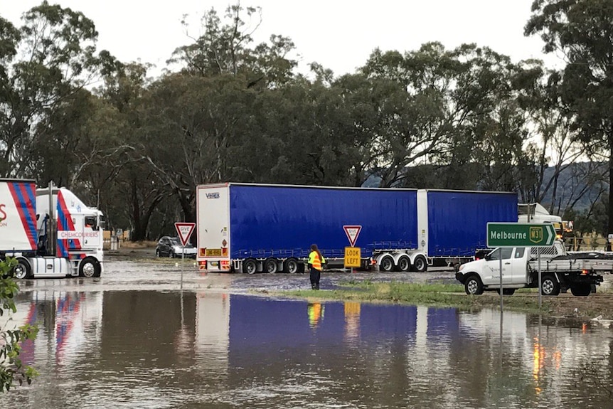 Rising floodwaters cause trucks to be diverted southbound