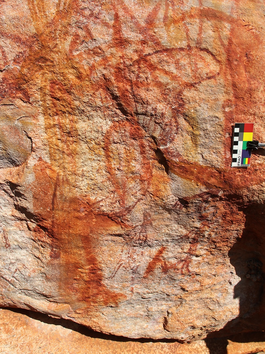 Rock art painting of a dugong