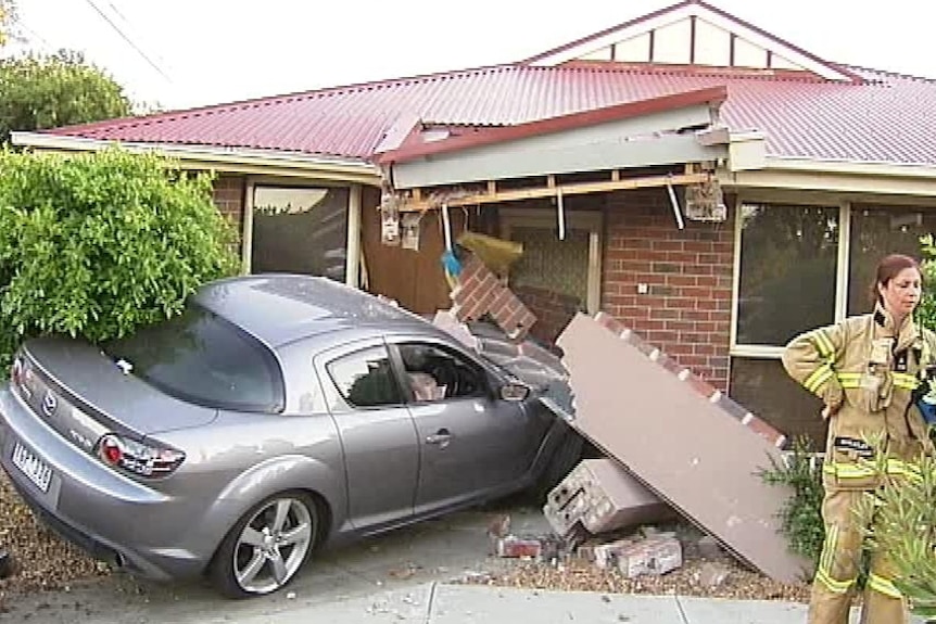 In Altona North, a car being pursued by police crashed into a house, narrowly missing an 89-year-old woman inside.