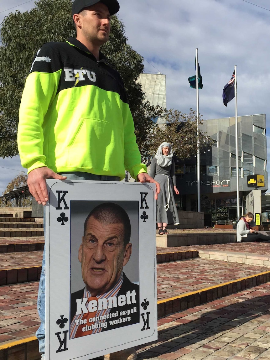 Workers at Federation Square on the way to Crown Casino to protest job cuts