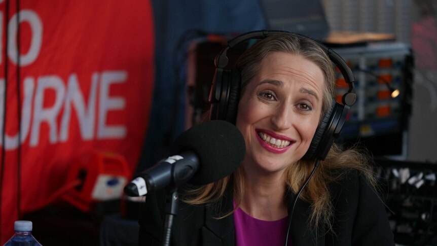 kate ashmor smiles during radio interview on ABC Melbourne