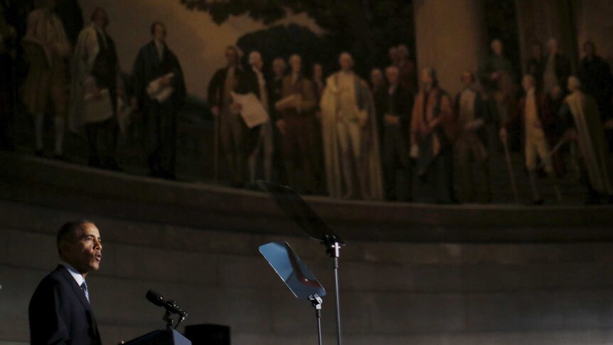 US President Barack Obama delivers remarks at naturalization ceremony at the National Archives Museum in Washington