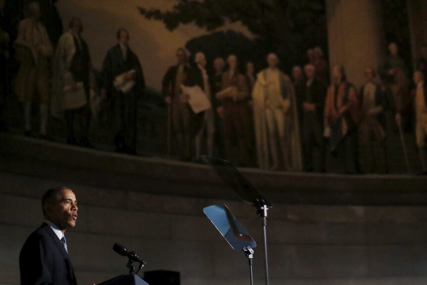 US President Barack Obama delivers remarks at naturalization ceremony at the National Archives Museum in Washington