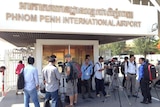 Media wait for Nauru refugees at Phnom Penh airport
