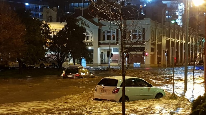 Cars swept away by flooding in Hobart during unprecedented rainfall, May 11, 2018.