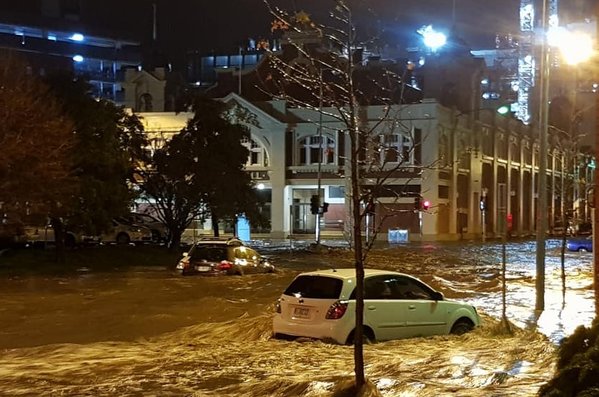Cars swept away by flooding in Hobart during unprecedented rainfall, May 11, 2018.