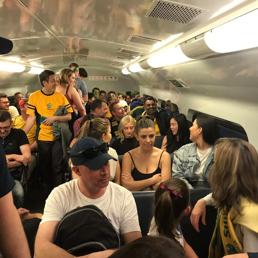 Socceroo fans stuck on train