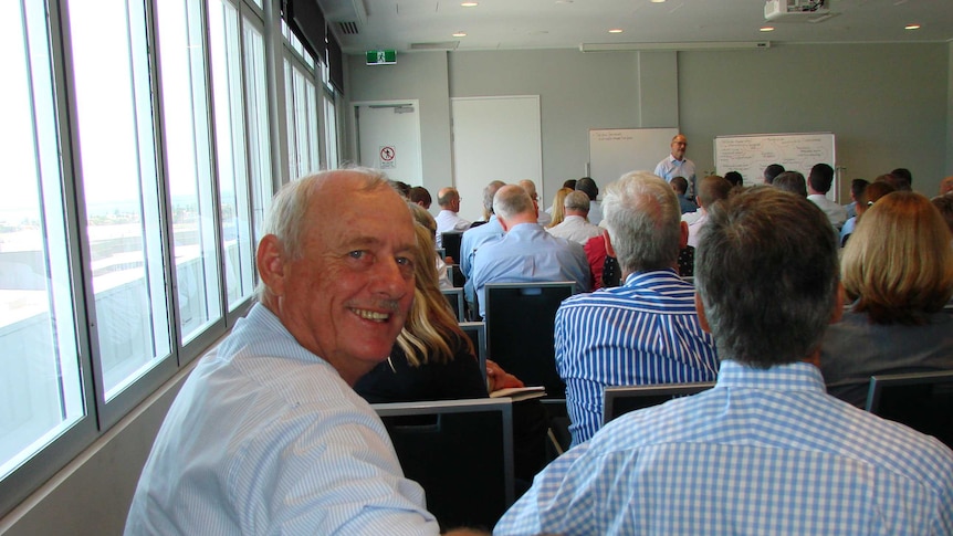 Queensland cattle producer Wallace Gunthorpe representing bovine Johne's disease producers smiles at the camera during meeting