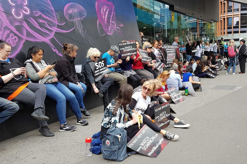 Protesters chained to the entrance of the Melbourne aquarium.