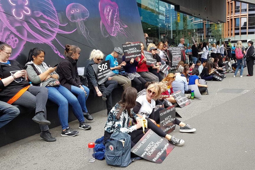Protesters chained to the entrance of the Melbourne aquarium.