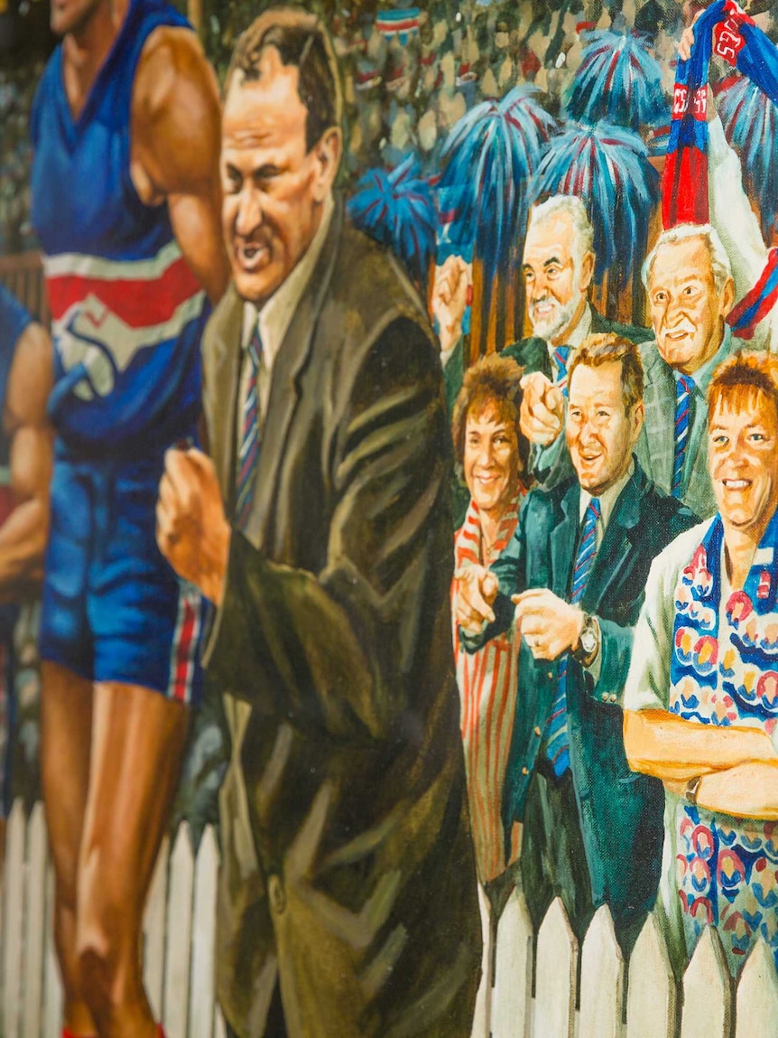 A vibrant painting of the bulldogs team of the century.