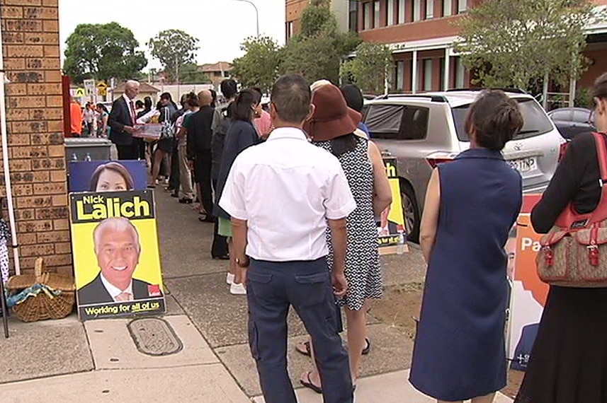 Voters lining up outside a polling booth