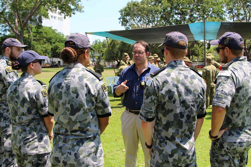 Labor's Luke Gosling speaks with ADF personnel in Darwin on Remembrance Day 2015.