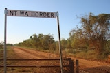 A street sign in a remote part of the outback on the WA and NT border.