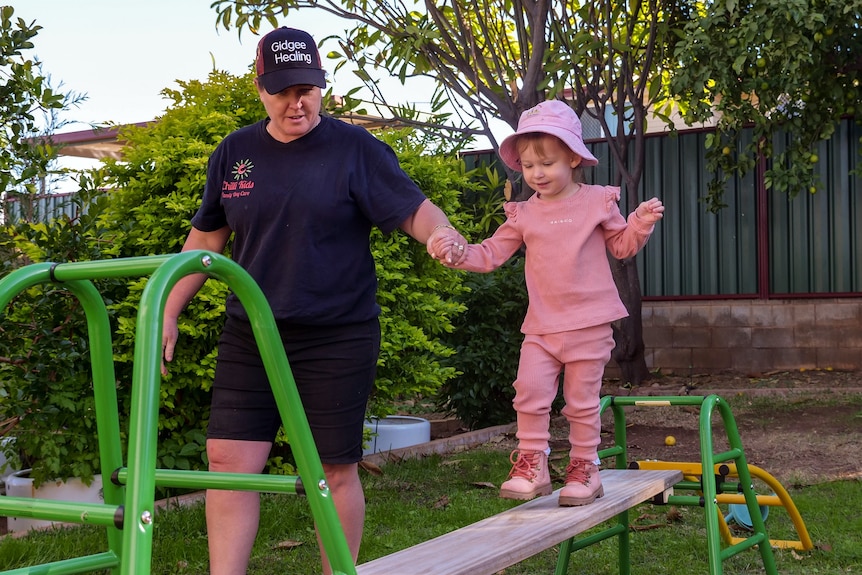 Tamara and Sienna Garrett in a playground.