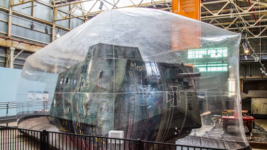A WWI tank in a giant bubble.