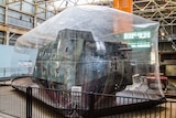 A WWI tank in a giant bubble.