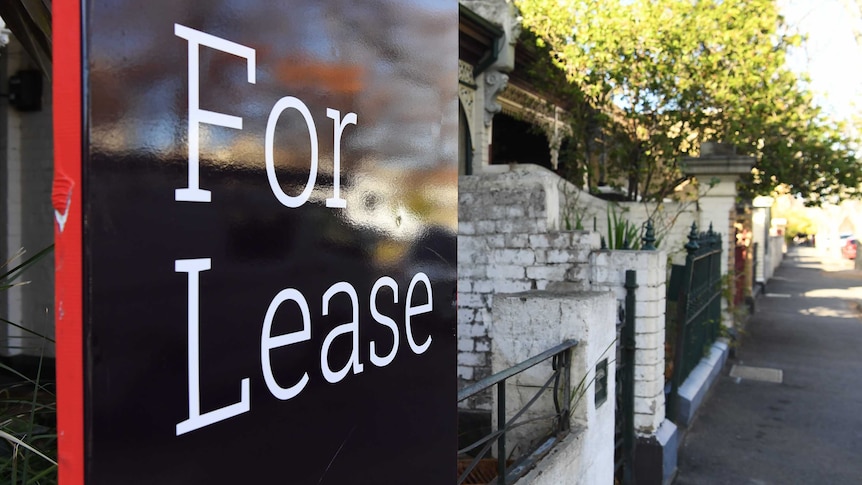 A For Lease sign advertising a rental property in Carlton North.