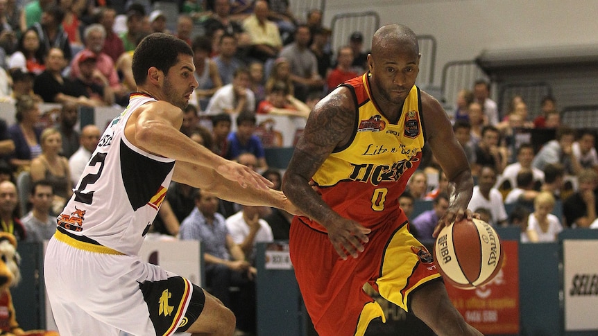 Tigers guard Ayinde Ubaka (R) was sacked by club CEO Seamus McPeake during coach Trevor Gleeson's press conference.