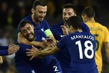Greece celebrates a Ioannis Maniatis goal