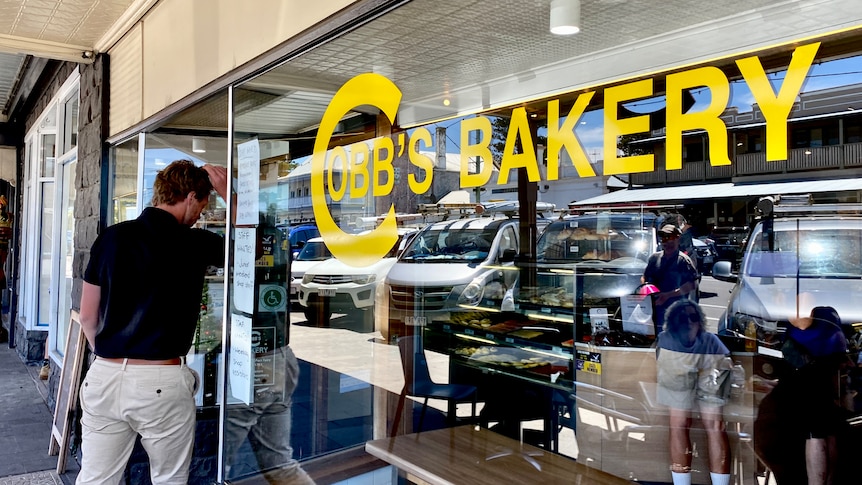 A man walks into Cobb's Bakery in Port Fairy