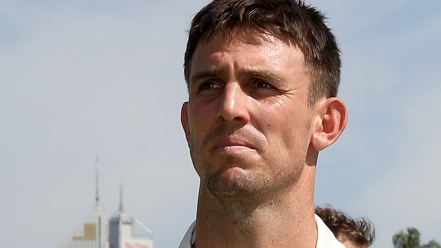 A headshot of Mitch Marsh with the Perth skyline in the background.