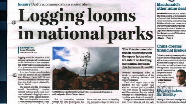 A newspaper article with headline "Logging looms in national parks"