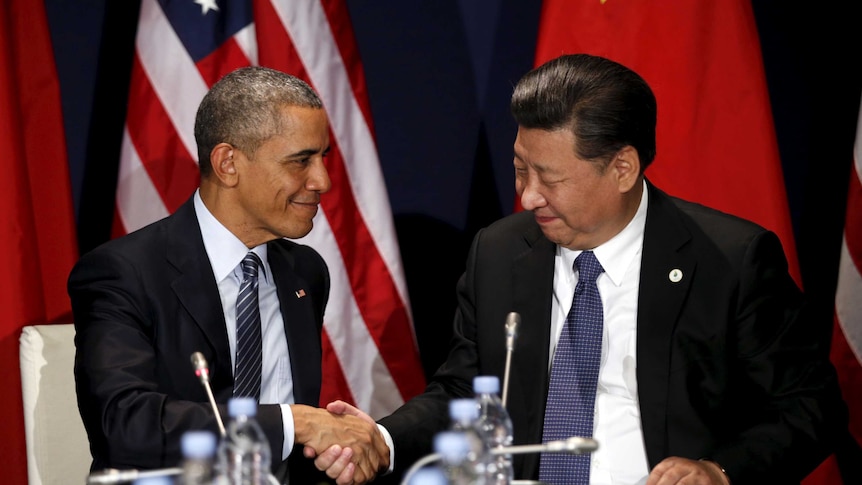 US president Barack Obama shakes hands with Chinese president Xi Jinping.