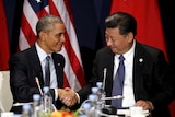 US president Barack Obama shakes hands with Chinese president Xi Jinping.