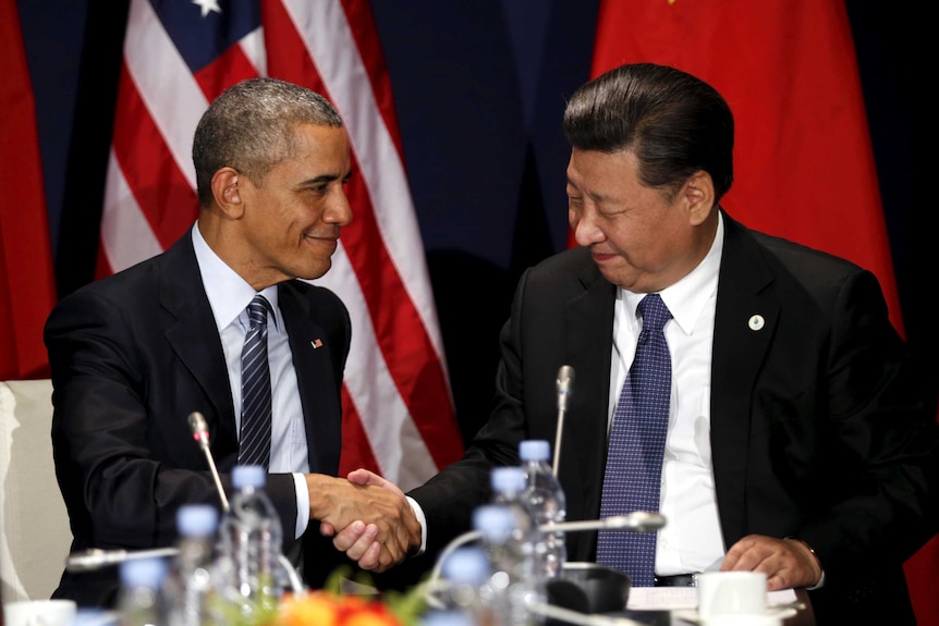 US president Barack Obama shakes hands with Chinese president Xi Jinping.