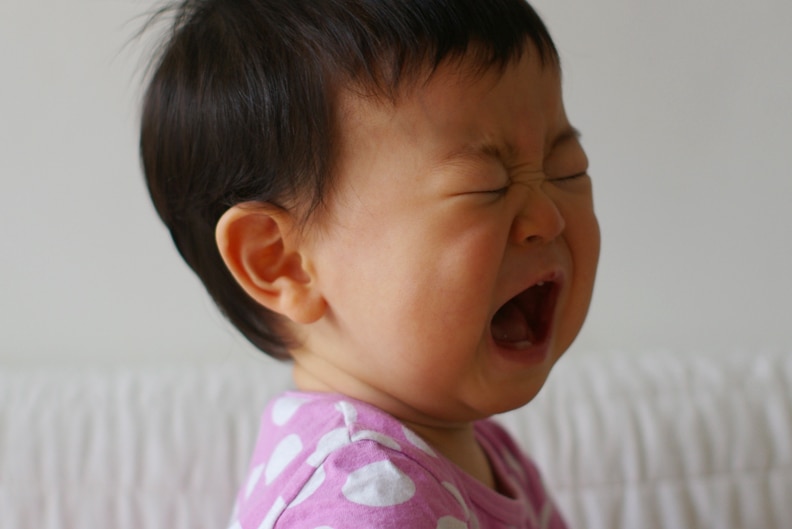 A small child crying.
