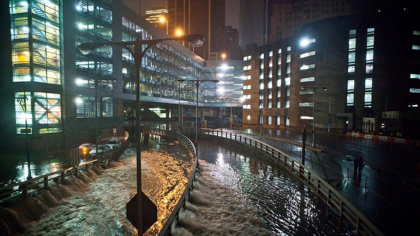 Floodwaters rush into the Carey Tunnel in NYC