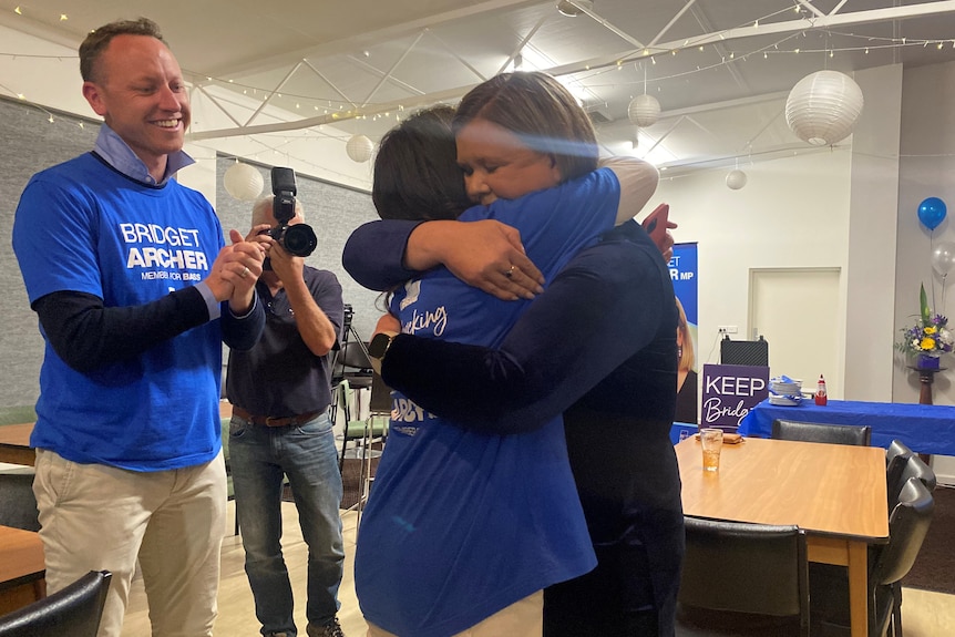 Liberal MP Bridget Archer hugs a supporter.