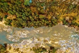 A birds-eye-view of the river and nearby bushland.