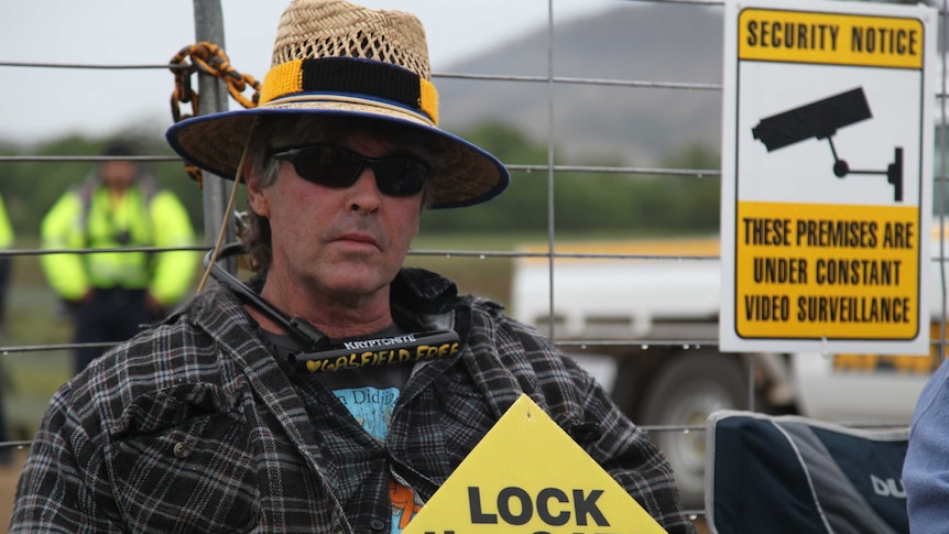 Brett Jacobs locked onto the gate at the AGL site near Gloucester.