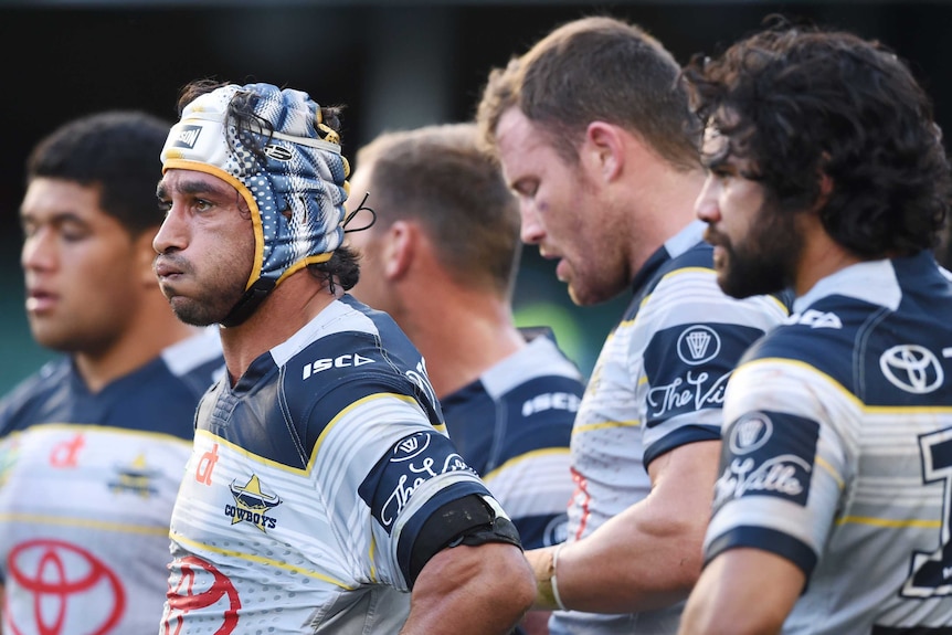 Johnathan Thurston and North Queensland Cowboys look on after Shaun Kenny-Dowall's try