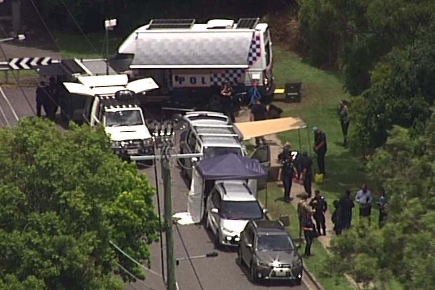 The police operation outside the home on Dyson Avenue.