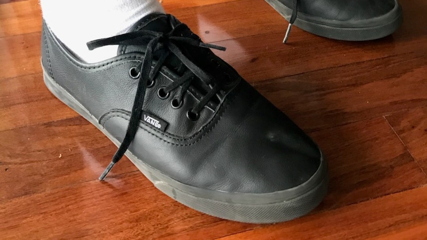Karen Bishop is angry that her daughter’s new black school Van shoes are banned by The Gap State High School.