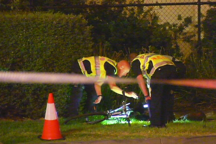 Police on the scene in Yarraville after a cyclist was fatally hit by a track in Yarraville.