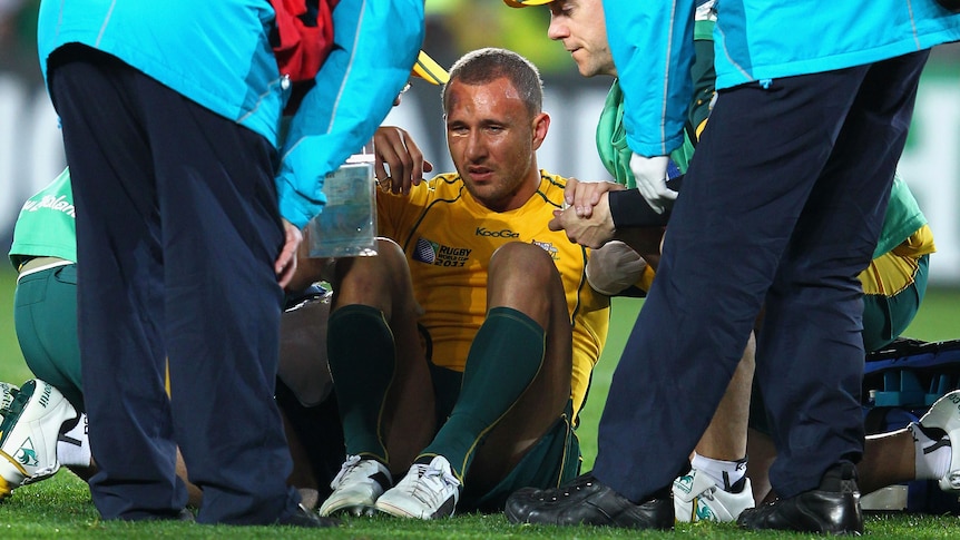 Ugly finish ... Quade Cooper is thought to have injured his ACL. (Getty: Sandra Mu)