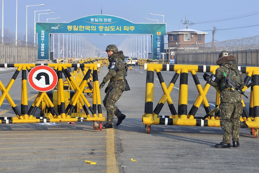 South Korean solider closes the road to Kaesong in North Korea