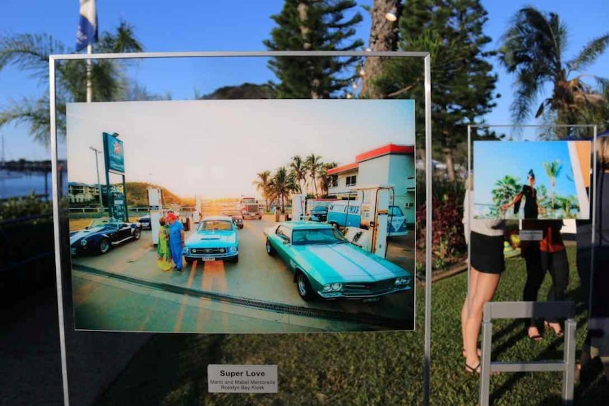 Large photographs on display outdoors