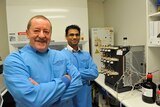 Professor Steve Wilton (left) and Dr Rakesh Veedu (rear) in a laboratory.