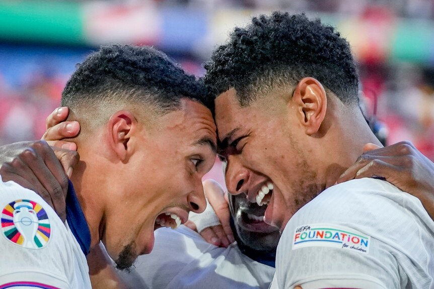 Jude Bellingham and Trent Alexander-Arnold smile forehead to forehead